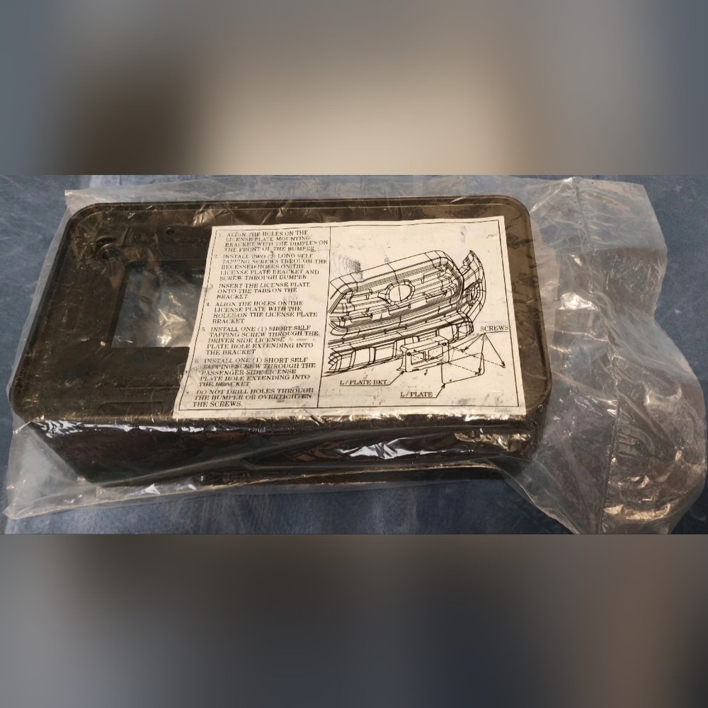 2016-2023 Toyota Tacoma Front License Plate Bracket Holder 75101-04011 OEM NEW